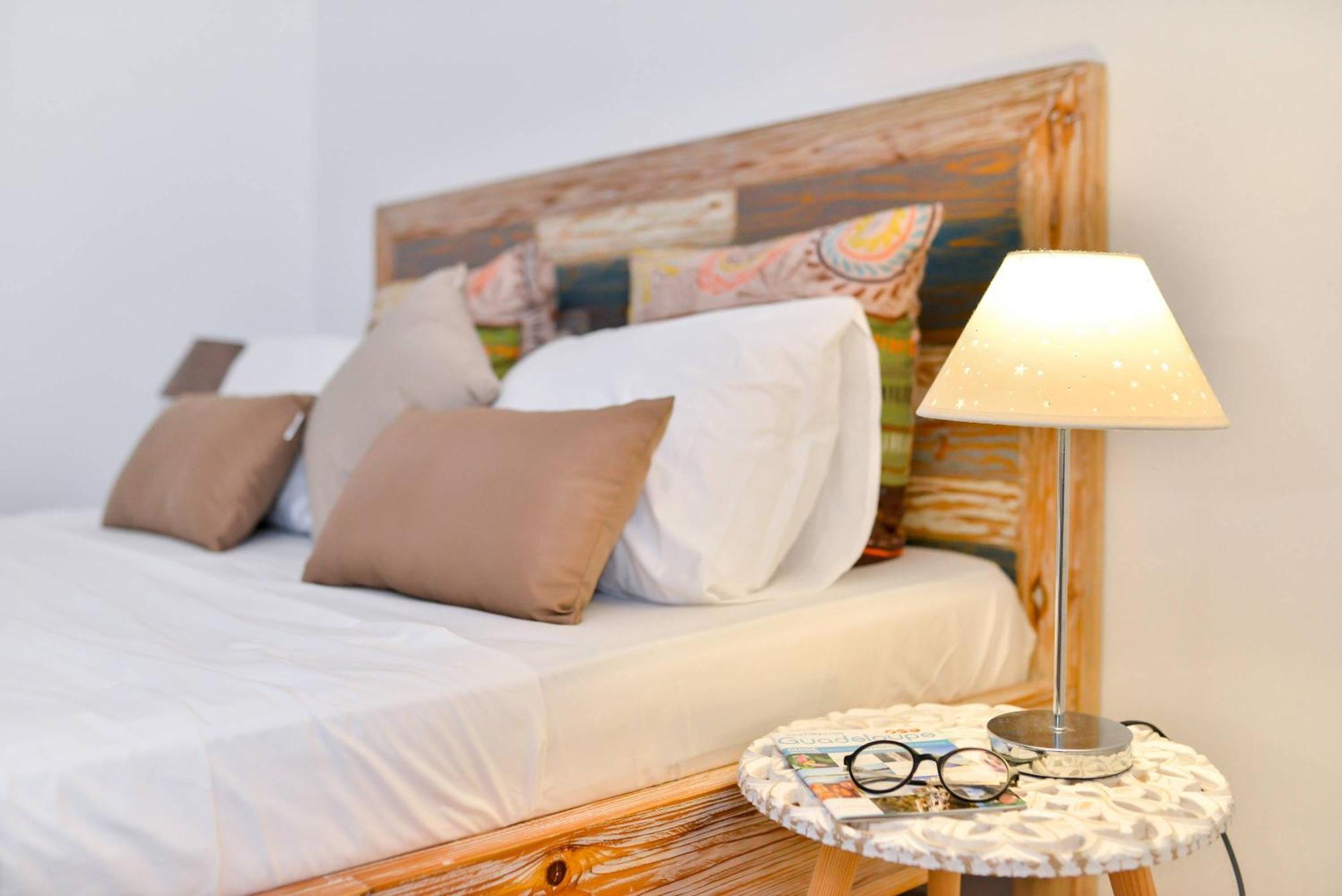 Les jardins de CHANTILLY -Bungalows avec jardins et piscines privées Baie-Mahault Chambre photo